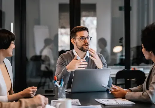 People sitting at a table for a business meeting